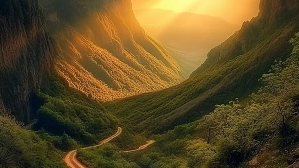 A valley pathway towards the dawn sunrise.